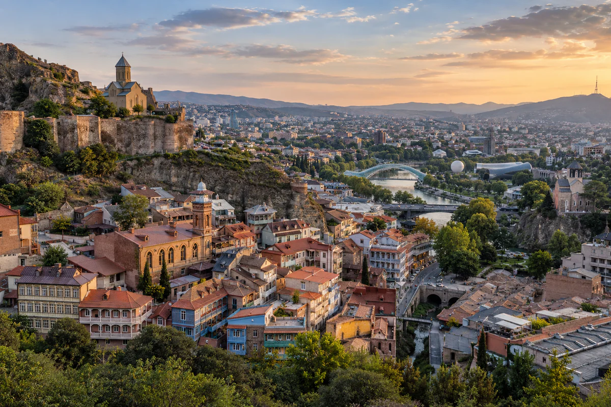 Elevated view of Tbilisi with the Kura River and old town rooftops